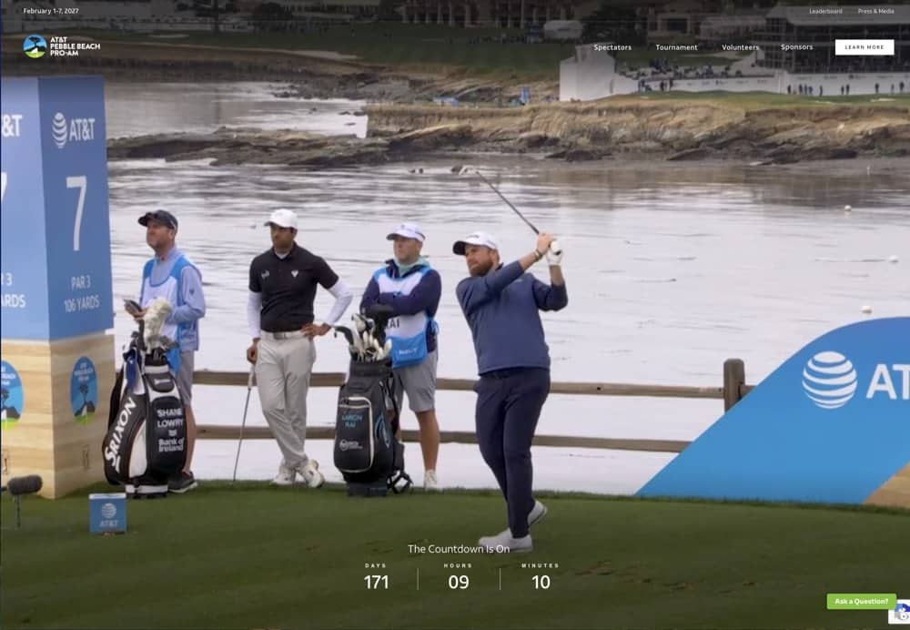 attpbgolf.com homepage hero: a player teeing off on the seventh at Pebble Beach with the coastline behind