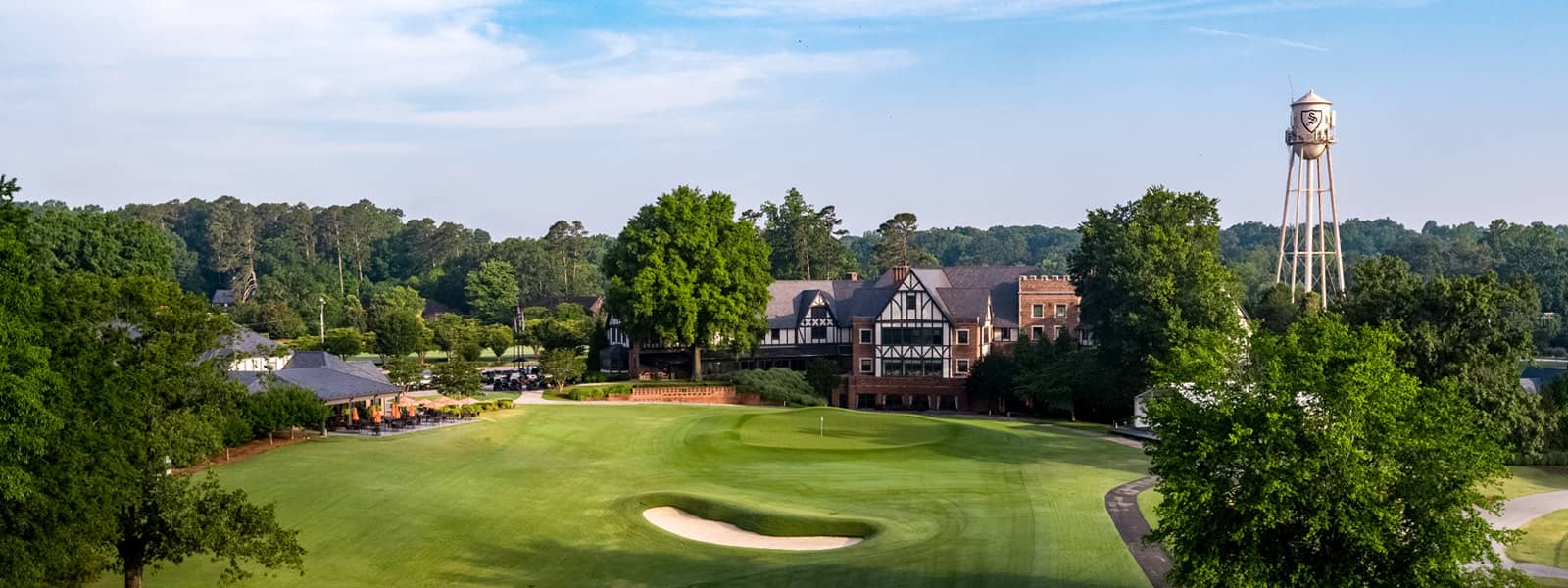 Aerial view of the clubhouse and closing hole at Sedgefield Country Club